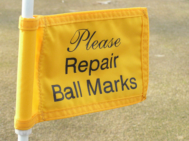 repair-ball-marks-sign